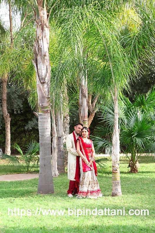 Bride and Groom in traditional Hindu wedding attire after a sacred ceremony for couple photography