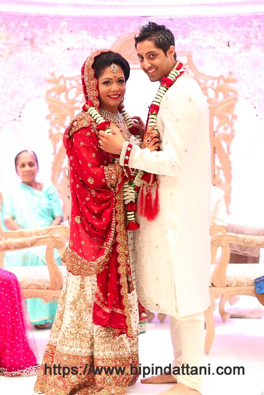 Bride and Groom exchanging Varmala during a traditional Hindu wedding ceremony