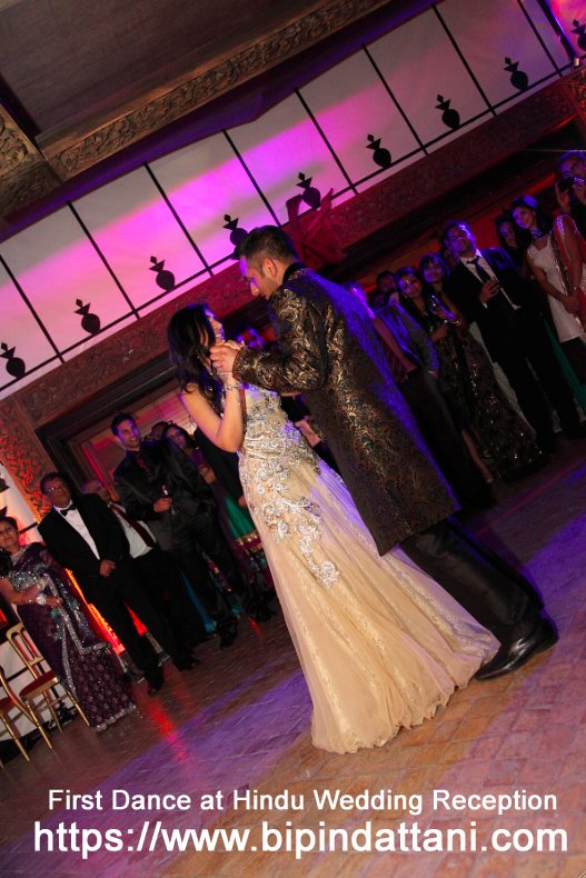 Indian Bride and Groom sharing their first dance at the wedding reception